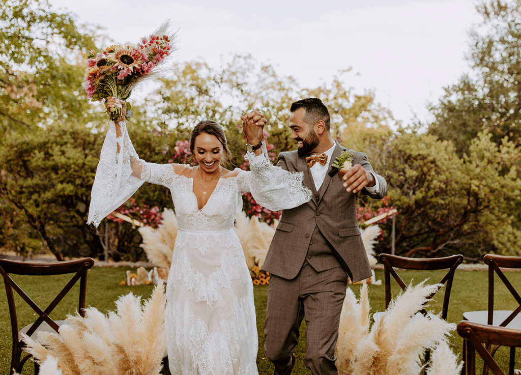 bohemian inspired wedding photoshoot with the bride holding pampas grass bouquet