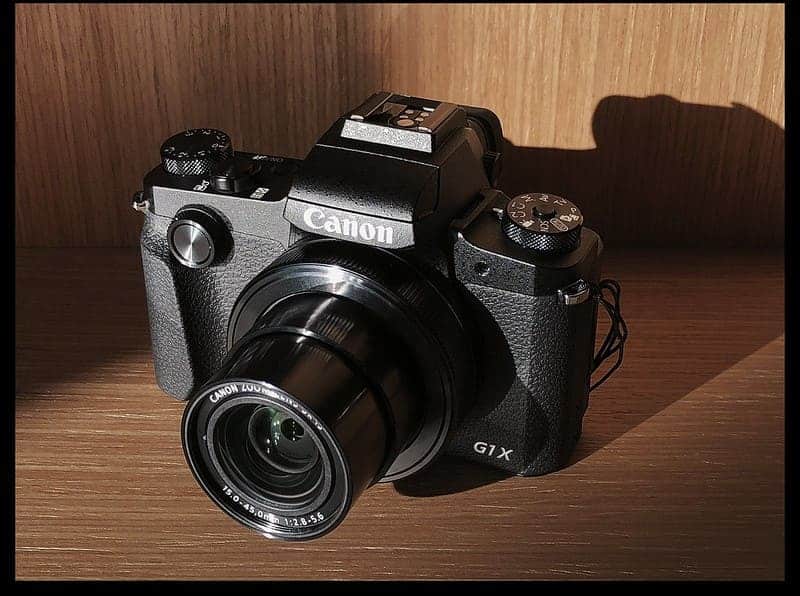 fujifilm X V camera placed on a surface