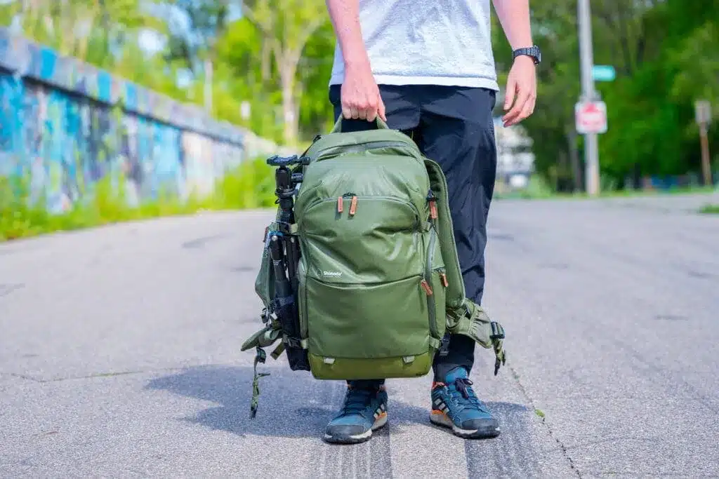 a person carrying shimoda backpack