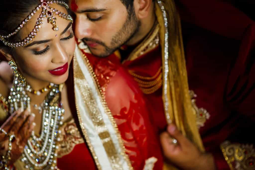 bride and groom posing for a picture