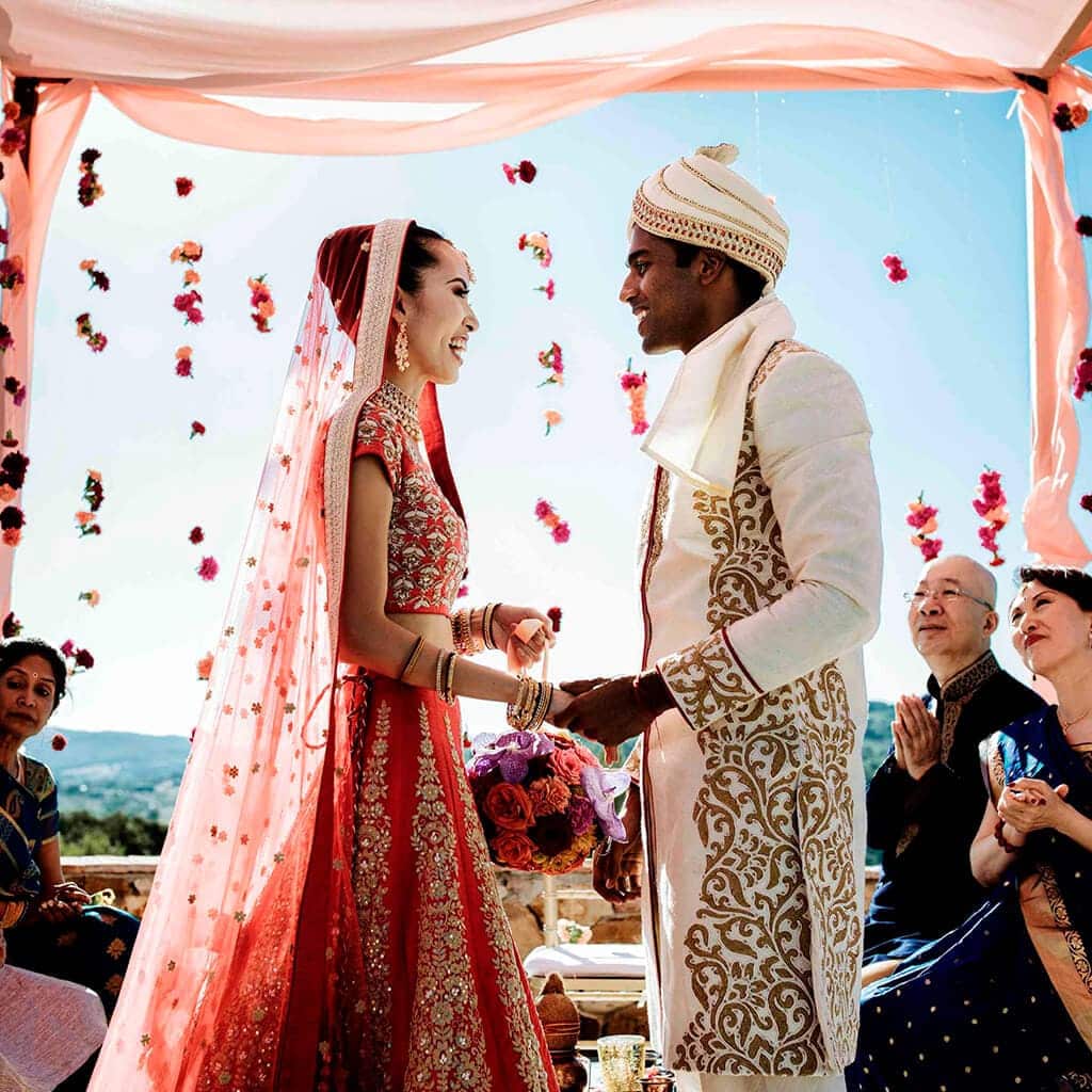 laughing bride and groom