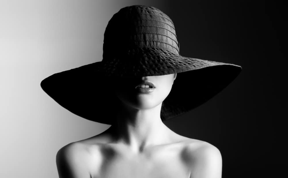 Fashion Woman In Hat Contrast Black And White