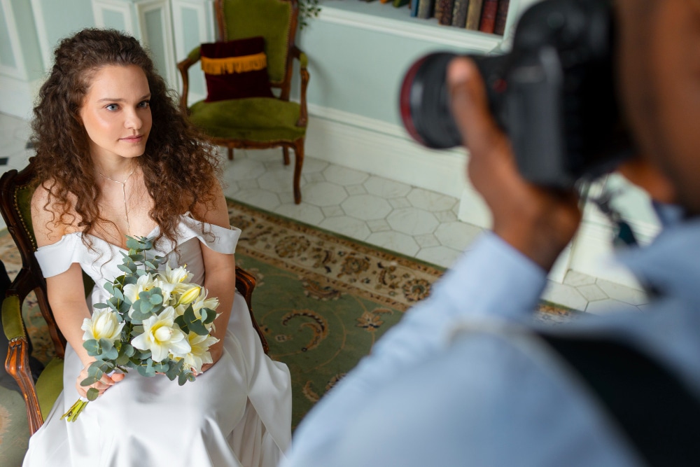 High angle photographer taking photos of bride
