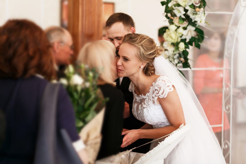  Guests congratulate the newlyweds on their wedding day.