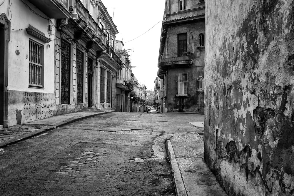 black and white image of an old street in Havana