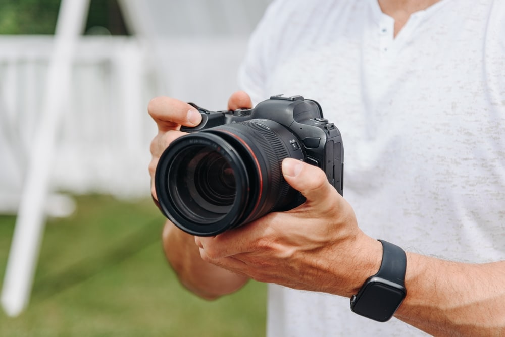 Dslr Camera In Hands Young Adult Caucasian Photographer In White