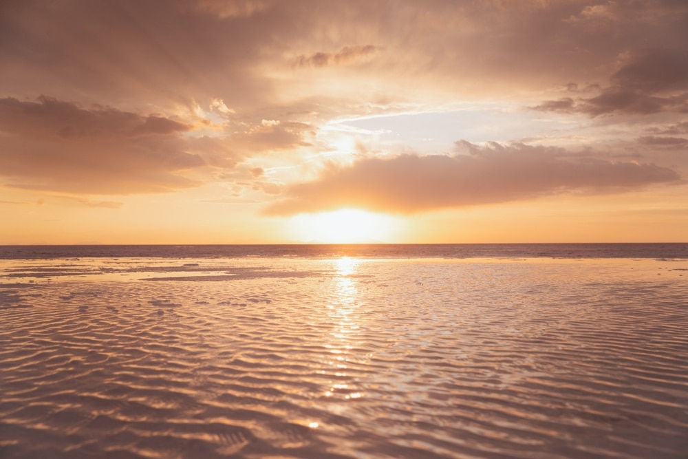 Landscape view of sunset with reflections in water